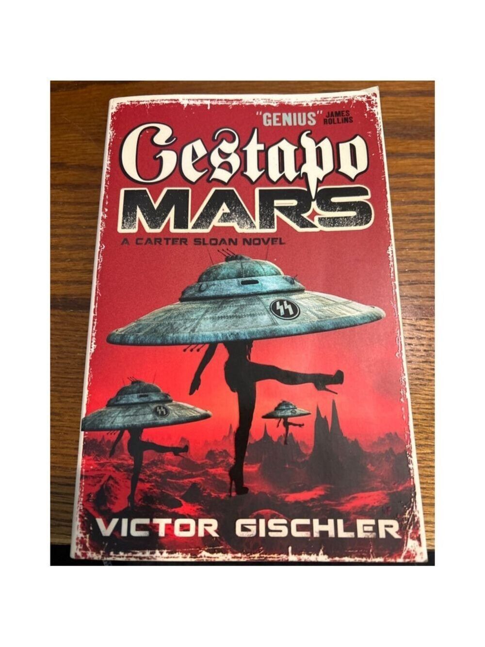 Gestapo Mars by Victor Gischler. It is described as an action-packed, pulpy scie